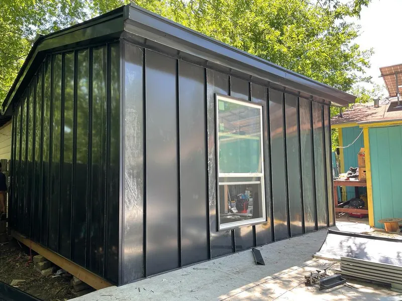 Black standing seam metal wall panels for Roof Inspection in Brookhaven